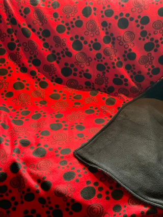 Red Paw Print Blanket with Black Fleece Backing