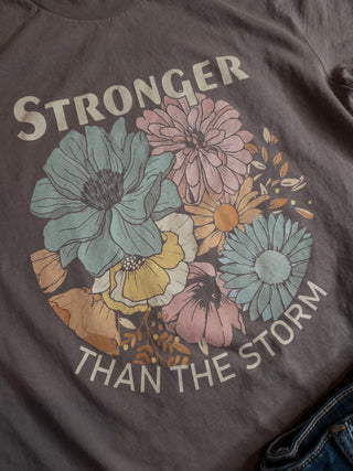 Stronger Than the Storm Pebble Brown Tee