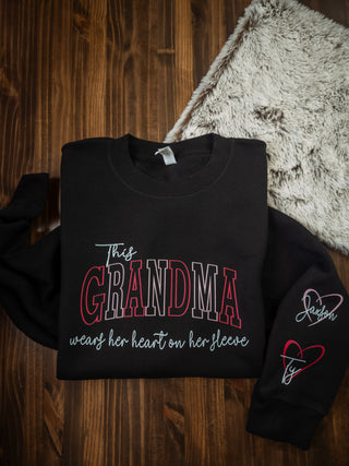 This Grandma Wears Her Heart On Her Sleeve Black Plush Crewneck Sweatshirt