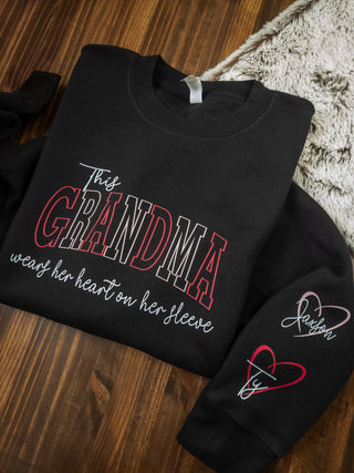 This Grandma Wears Her Heart On Her Sleeve Black Plush Crewneck Sweatshirt