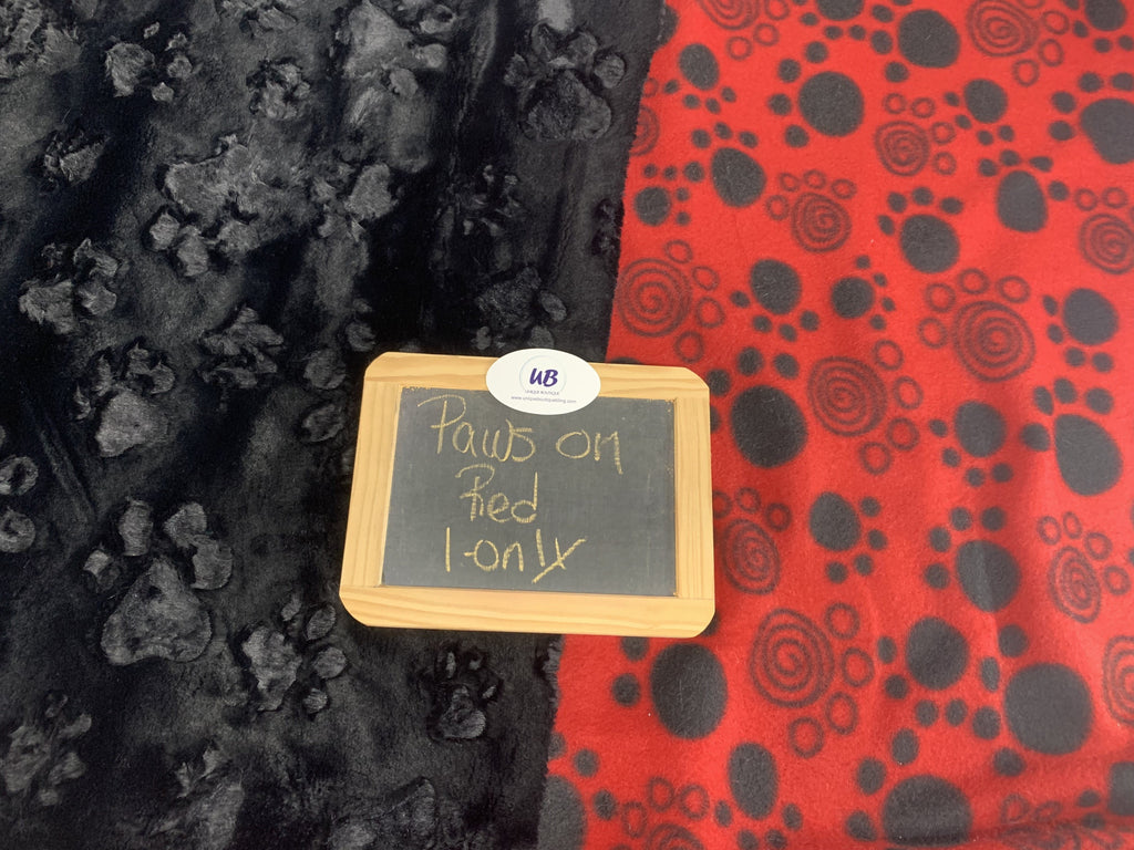 Paw Prints on Red Fleece Blanket with Black Paw Print Minky
