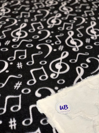 Music Notes on Black backed with White Moraccan Faux Fur